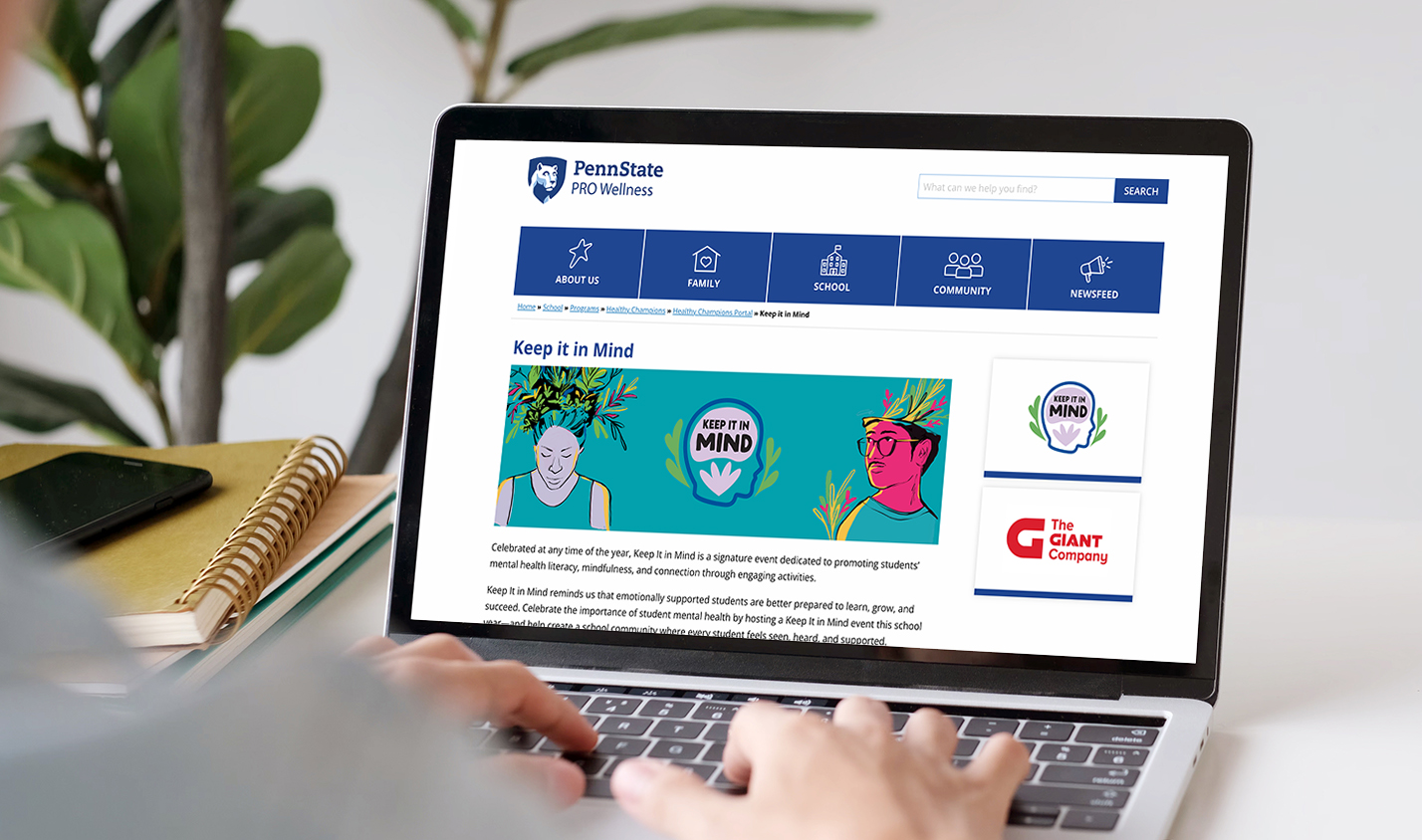 Laptop showing the landing page for Keep it in Mind, a school event promoting mental health